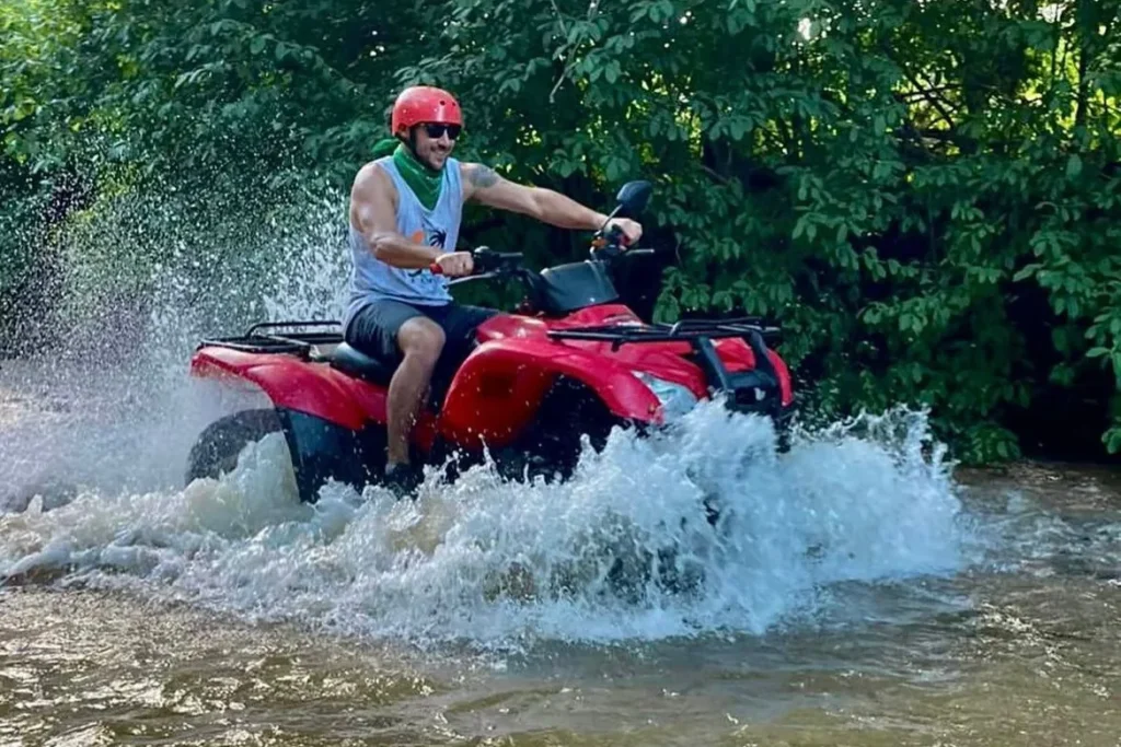ATV tour passing through a rural village in Guanacaste, Costa Rica