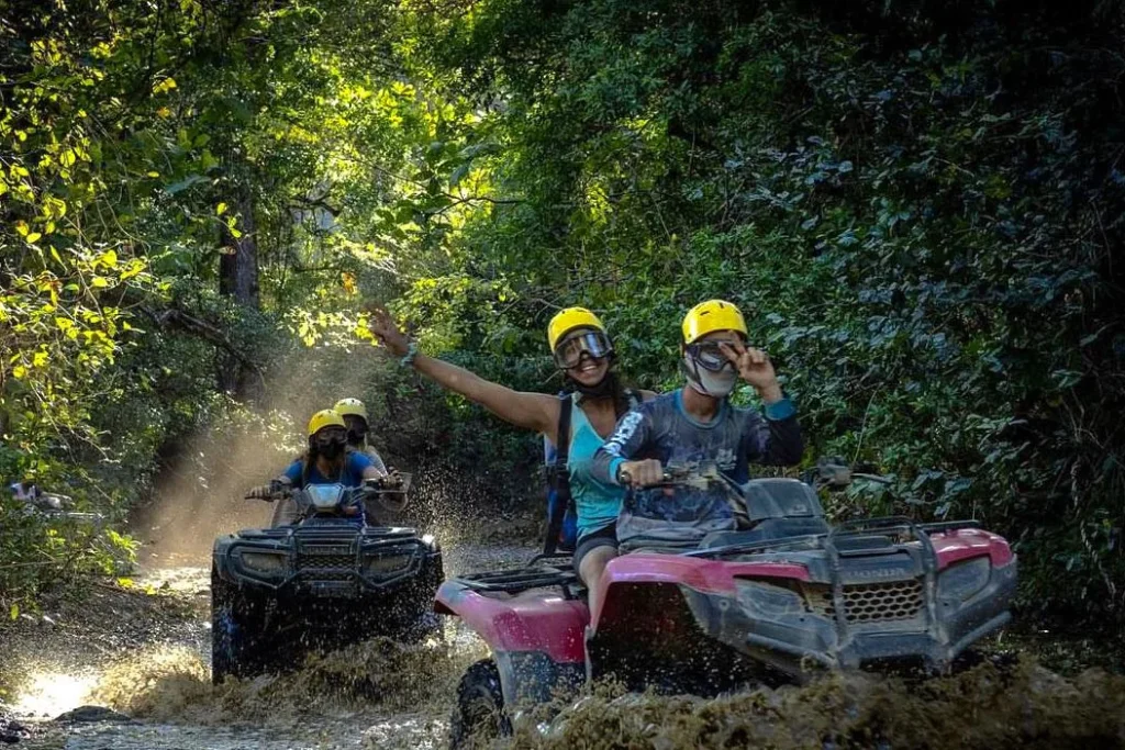 Guests meeting locals during an ATV tour in rural Guanacaste, Costa Rica
