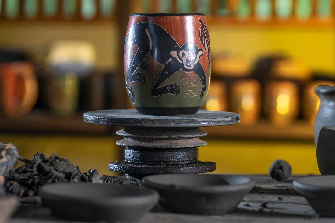 Hand-painted pottery vase on a potter's wheel in a Guaitil workshop, Guanacaste, Costa Rica