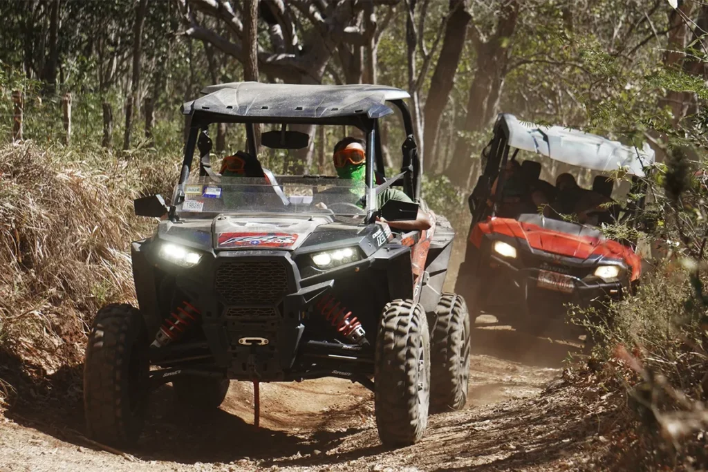 Buggy splashing through a river crossing on a Guanacaste adventure tour