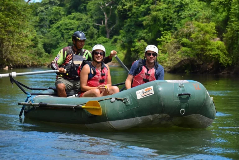 Guests enjoying a private Tenorio river float tour with their guide, Guanacaste