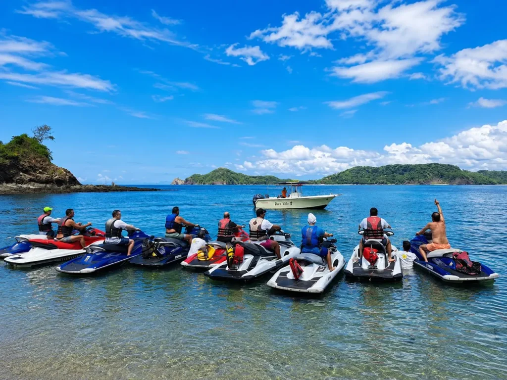 Group of jet skis gathered in a bay on a guided tour in the Gulf of Papagayo, Costa Rica