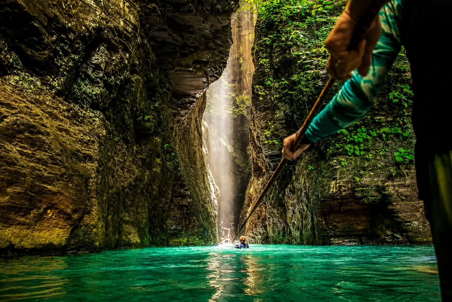 Sunlight beaming into the La Leona waterfall canyon on a Guanacaste hiking tour, Costa Rica