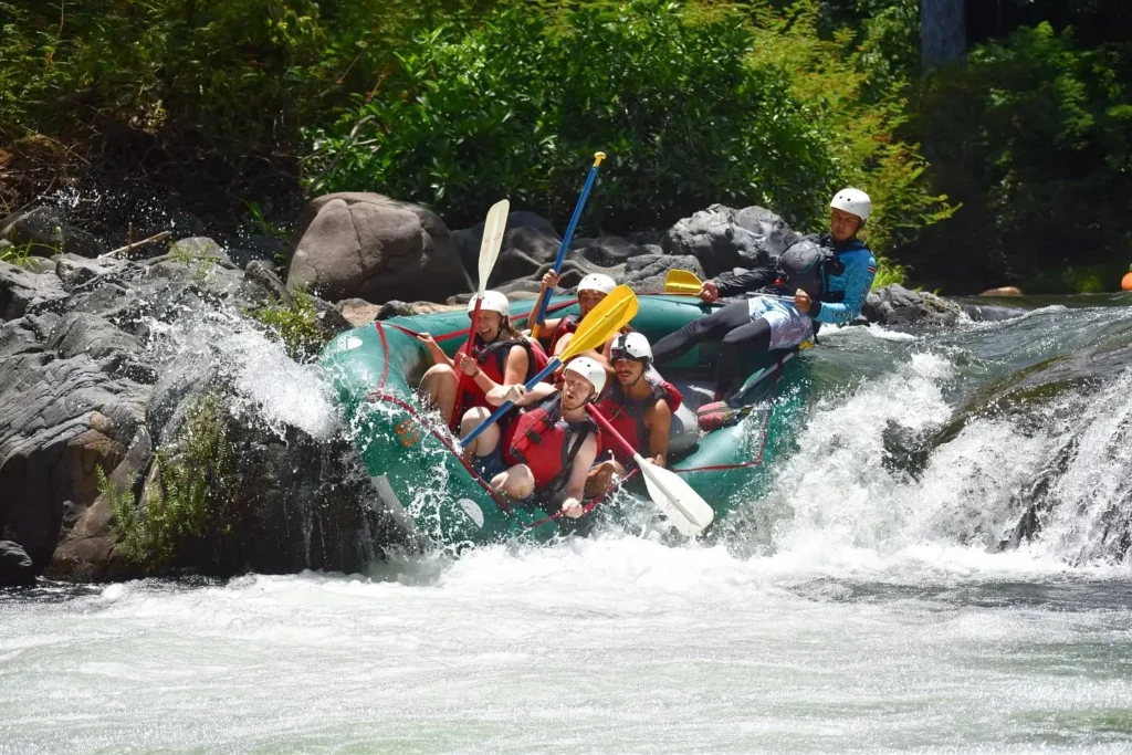 Rafting team paddling a rapid on the Tenorio River, Guanacaste
