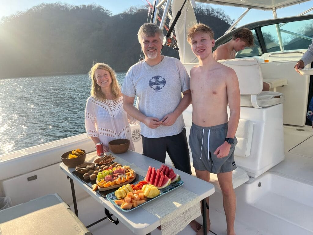 Fresh fruit platter aboard a private boat at golden hour in the Gulf of Papagayo, Guanacaste, Costa Rica